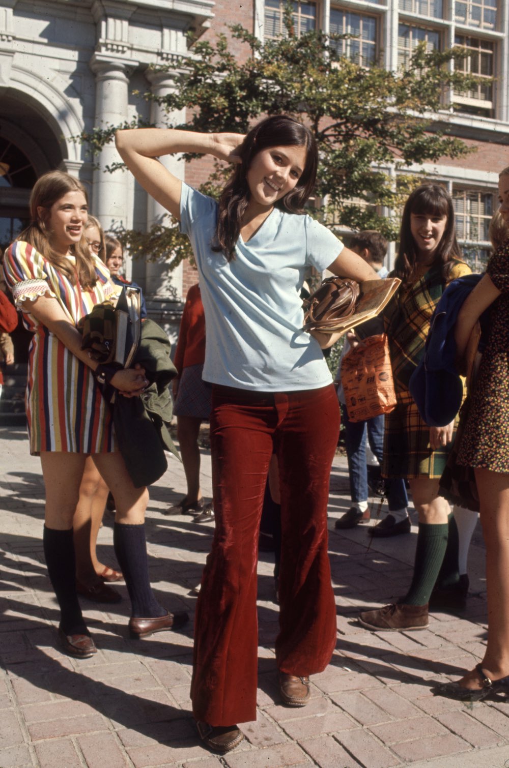 Subject: High school student wearing hippy fashion consisting of bell bottoms and boots. October 1969 Photographer- Arthur Schatz Time Inc owned merlin-1201962