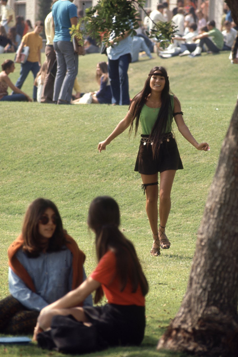 Subject: Southern California high school student walking toward other classmates while wearing the "Mini Jupe" skirt. California October 1969 Photographer- Arthur Schatz Time Inc Owned merlin- 1201968