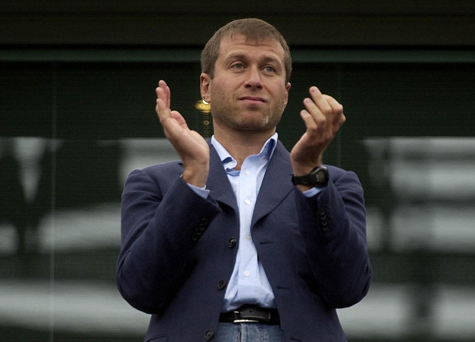 Chelsea's owner Roman Abramovich applauds his side onto the field  before their Barclays Premiership match against Southampton at Stamford Bridge, west London, Saturday August 28, 2004. PA Photo: Chris Young.   THIS PICTURE CAN ONLY BE USED WITHIN THE CONTEXT OF AN EDITORIAL FEATURE. NO WEBSITE/INTERNET USE UNLESS SITE IS REGISTERED WITH FOOTBALL ASSOCIATION PREMIER LEAGUE.